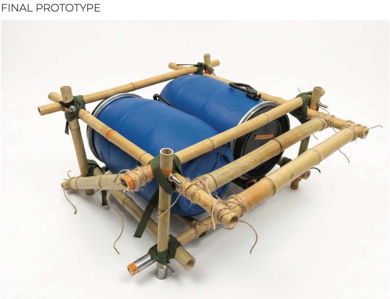 Bamboo raft with two blue barrels joined by green straps and screws