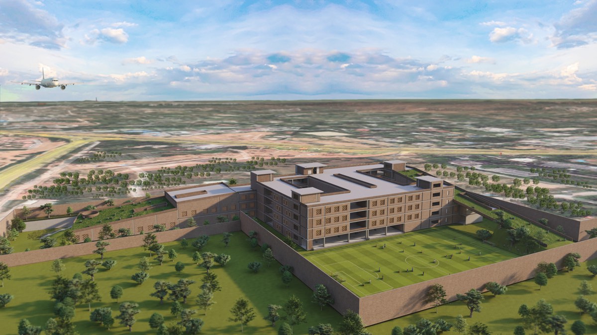 Aerial render of a school with sloping green roofs
